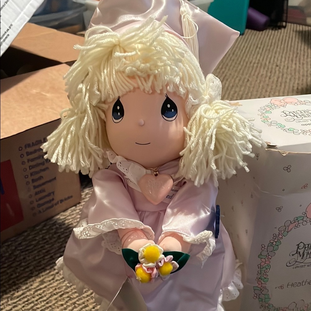 Precious Moments “Heather” 1993 graduation doll. Original box and tags.